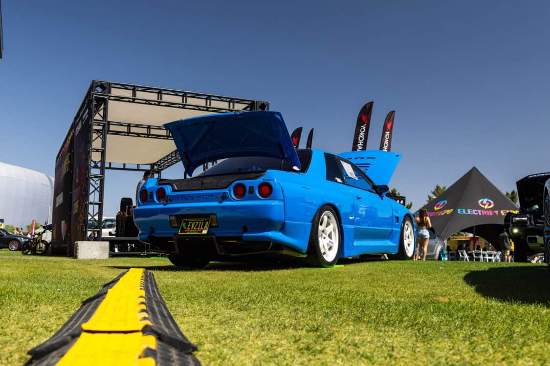 Eric and Amanda Dotson - 1990 Nissan Skyline GTR R32 - Electrify Showoff Phoenix 2024 - FRP fenders