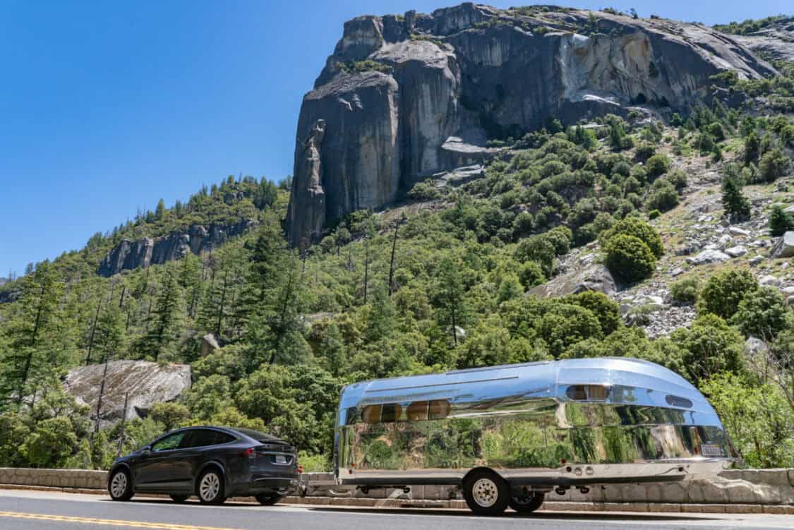 Bowlus Endless Highways 2025 95th Anniversary Edition electric RV recreational vehicle towed by a Tesla Model Y