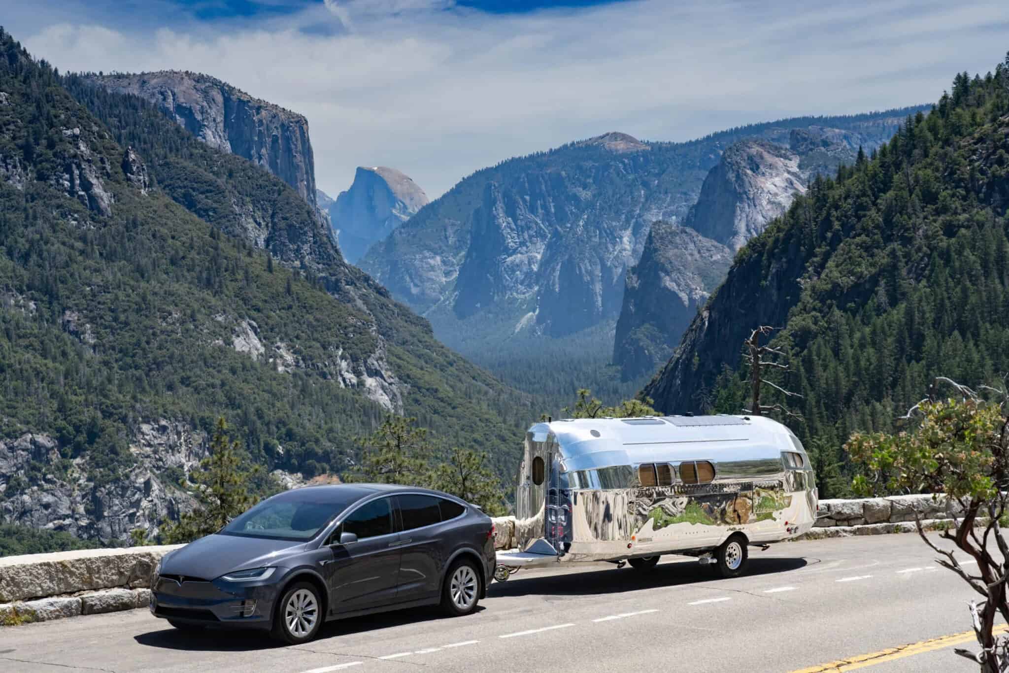 Bowlus Endless Highways 2025 95th Anniversary Edition electric RV recreational vehicle towed by a Tesla Model Y