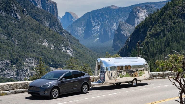 Bowlus Endless Highways 2025 95th Anniversary Edition electric RV recreational vehicle towed by a Tesla Model Y