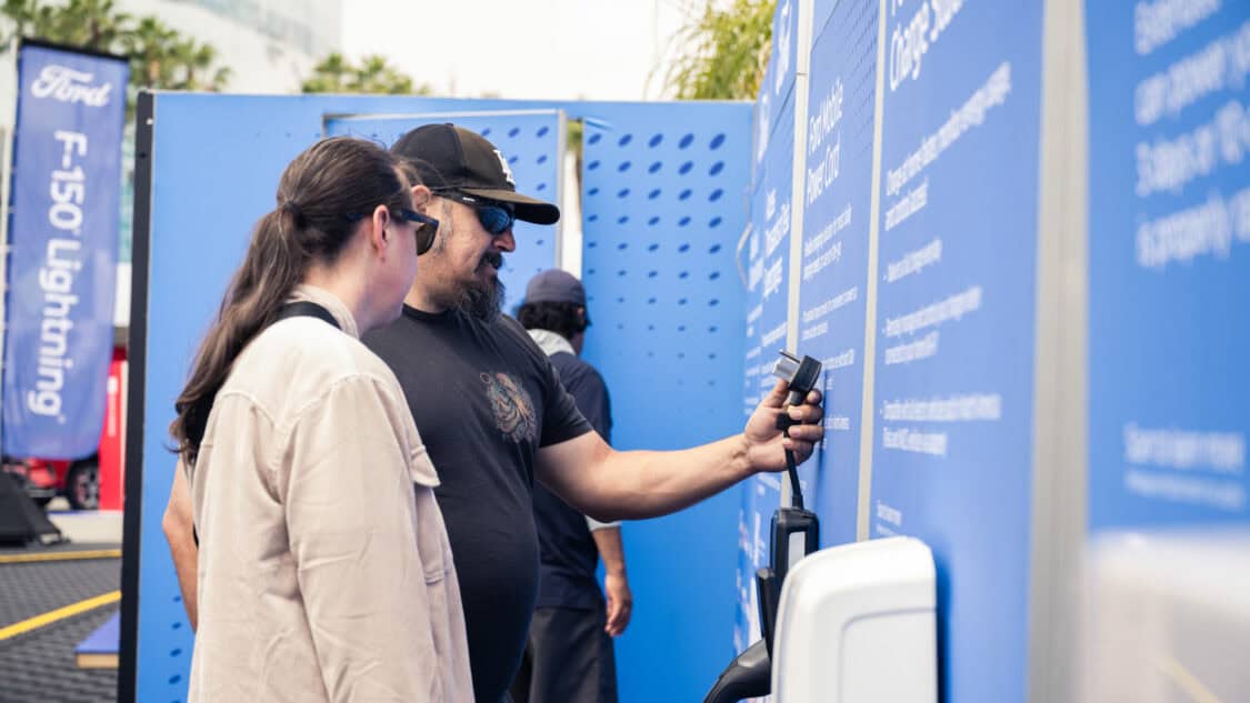 Electrify Expo attendee looking at Ford Level 2 Home EV Charging