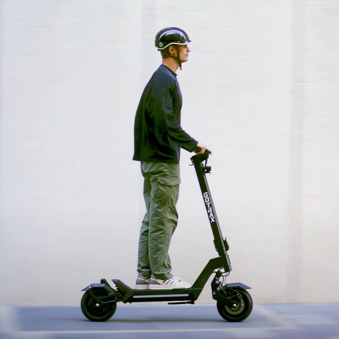 The Gotrax GX1 Dual Motor Electric Scooter - rider