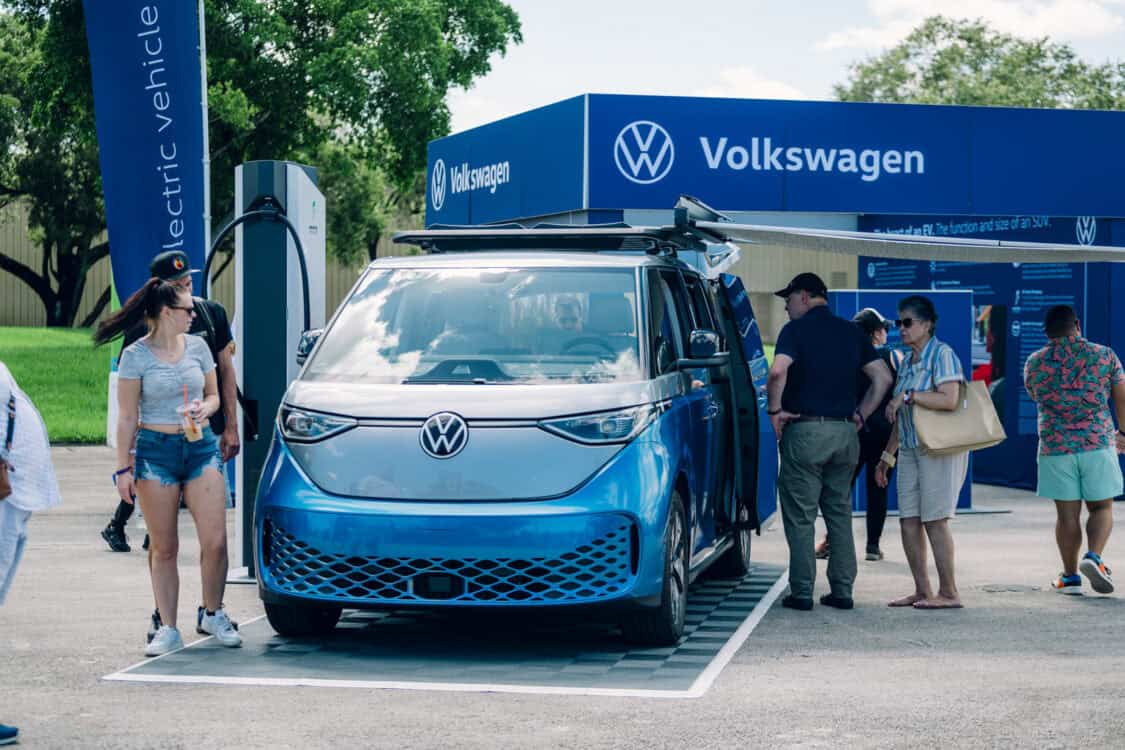 VW ID. Buzz electric microbus minivan with camping awning displayed at Electrify Expo