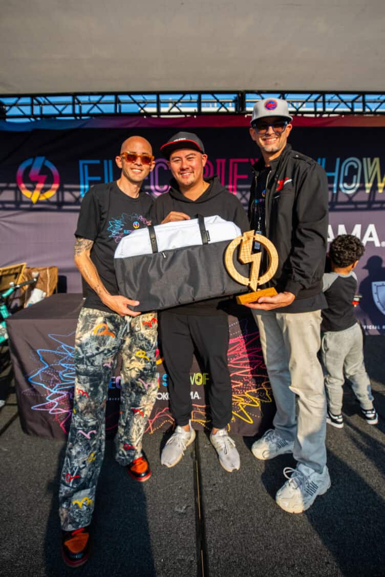 Electrify Showoff awards - Best of Show - Meric Cuevas, 2018 Tesla Model 3, presented with a custom Showoff bag by Lunar Plus.