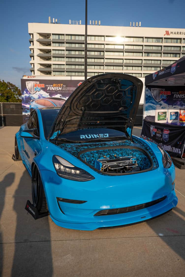 AJ Velasco's Tesla Model 3 at POR-15 booth at Electrify Showoff NY