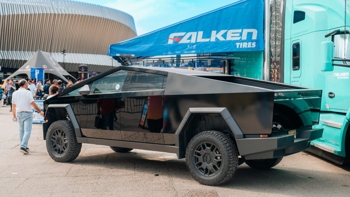 Gloss black Tesla Cybertruck displayed in the Falken Tires booth at Electrify Showoff NY