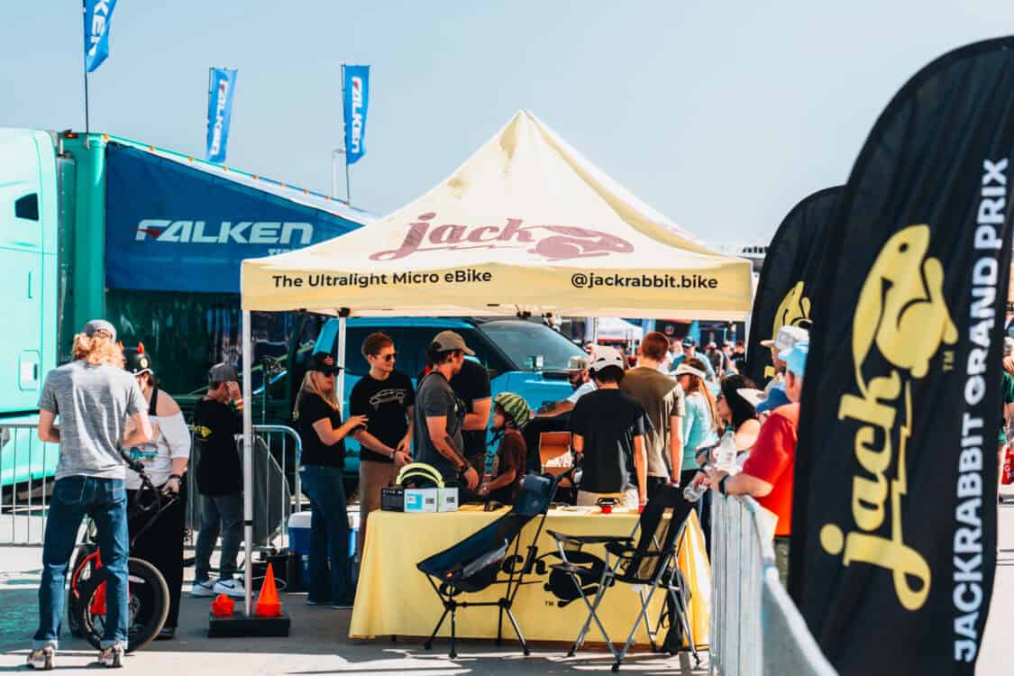 Electrify Showoff Austin EV Aftermarket - JackRabbit booth microbike electric mini bike demos