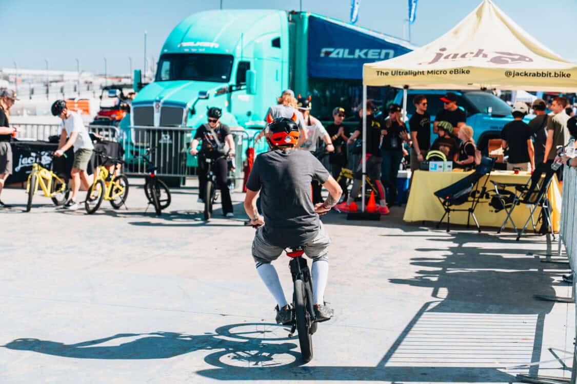 Electrify Showoff Austin EV Aftermarket - JackRabbit booth microbike electric mini bike demos