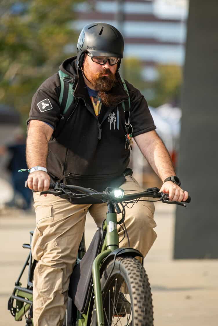 Attendee test riding and demoing the latest electric bike at Electrify Expo