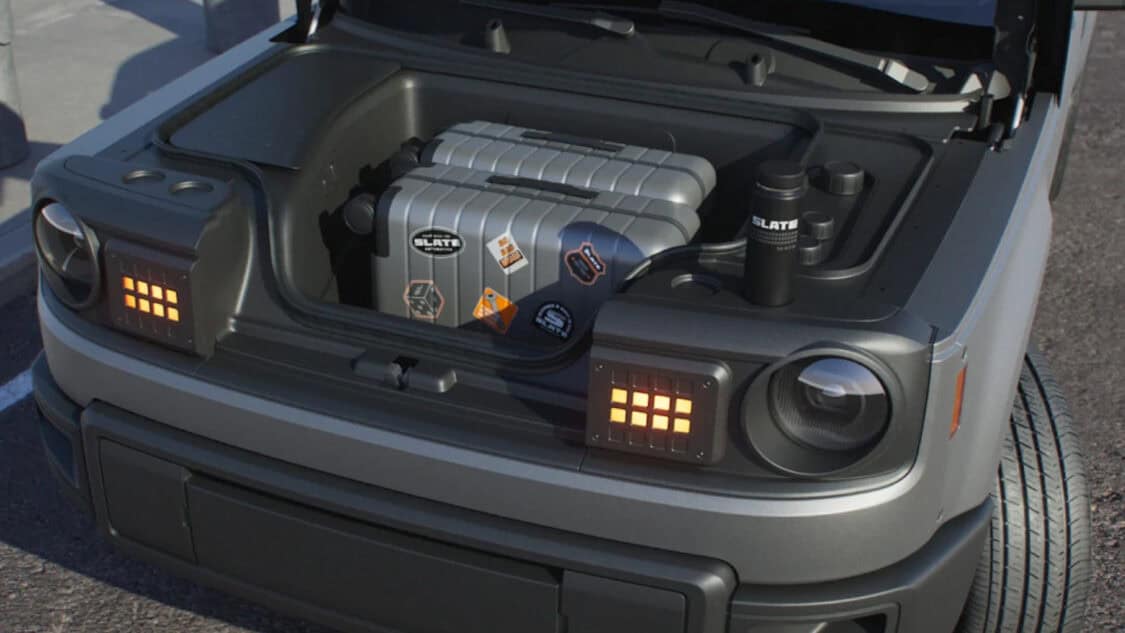 Traveling bags stored in the frunk of a Slate Auto EV Truck.