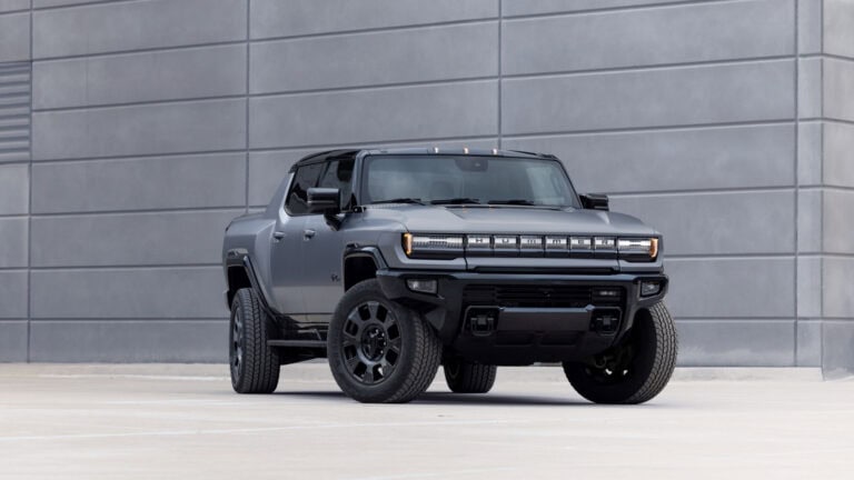 Front 3/4 view of the 2026 GMC Hummer EV Carbon Fiber Edition Pickup in exclusive Magnus Gray Matte exterior color.