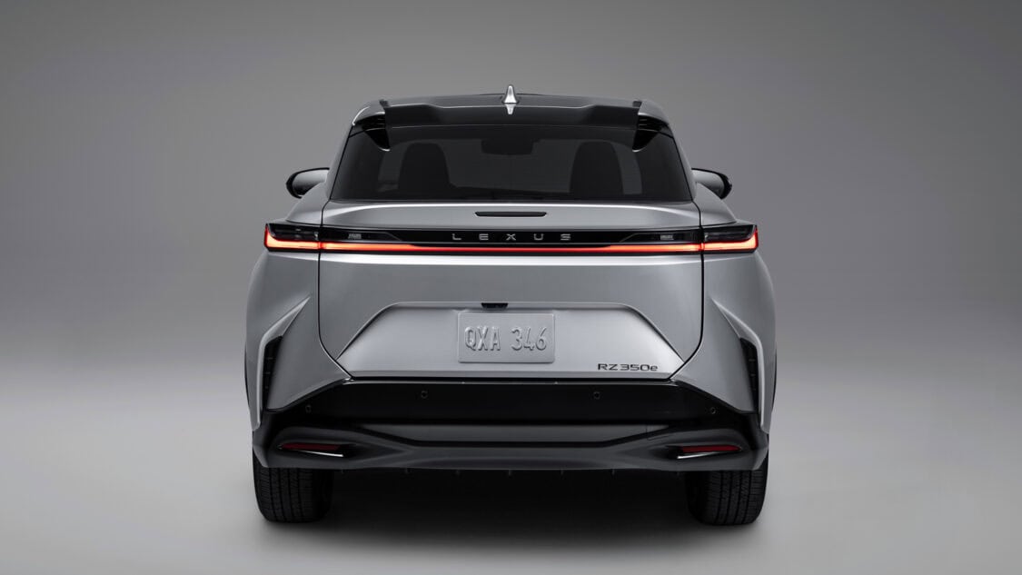 Rear taillights view of a 2026 Lexus RZ 350e electric SUV in Wind color, light gray with subtle metallics.