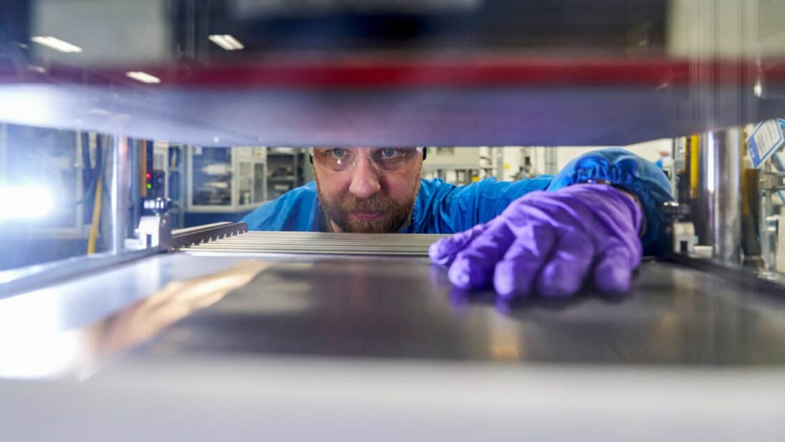 General Motors battery technician Steven Petty Jr. focuses on aligning electrodes on an anode sample for a prototype LMR battery cell in the making. (Photo by Steve Fecht for General Motors)