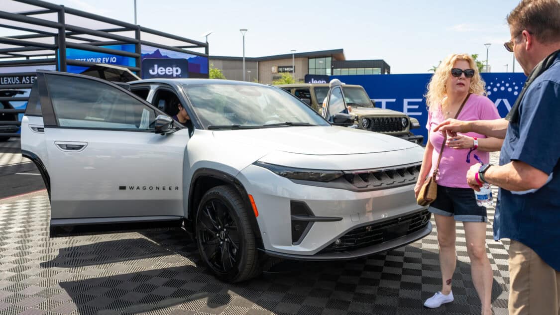 A silver Jeep Wagoneer S electric SUV is on display the Stellantis booth at Electrify Expo Phoenix 2025.
