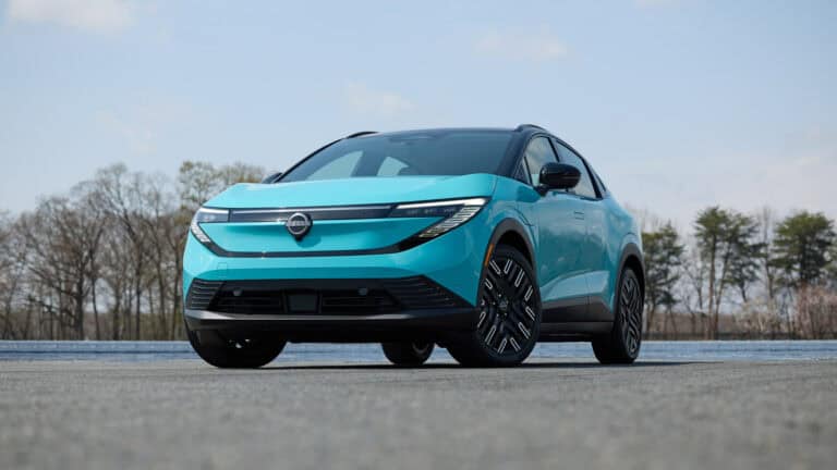 2026 Nissan Leaf compact electric SUV in Seabreeze Blue, showcasing its new crossover design and updated LED headlights.
