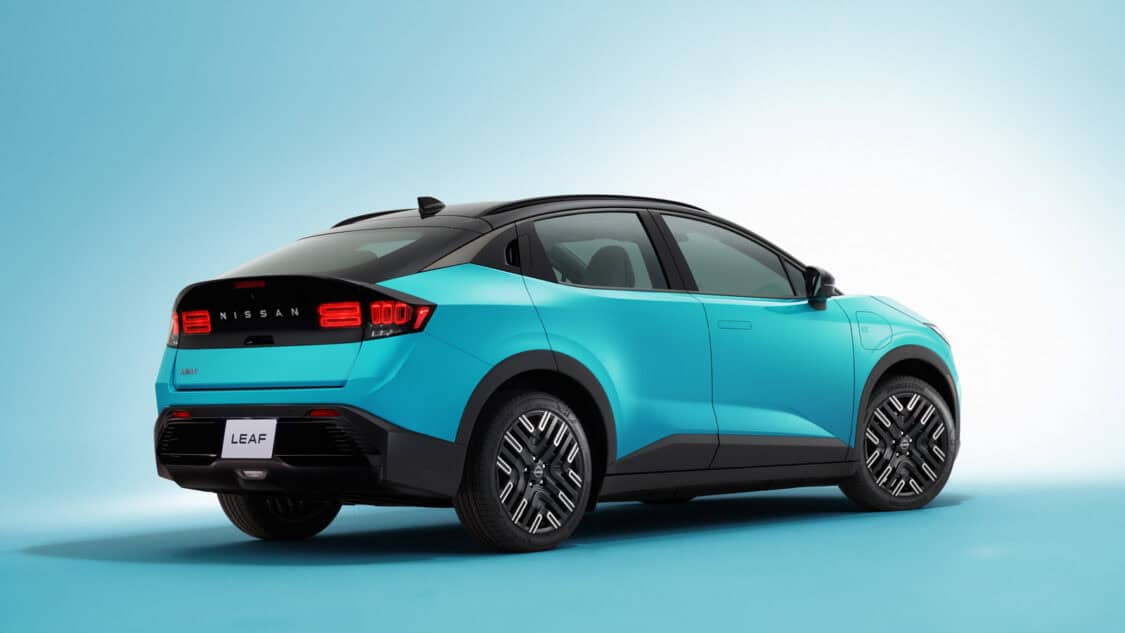 2026 Nissan Leaf compact electric SUV in Seabreeze Blue, showcasing its new crossover design and updated LED taillights.