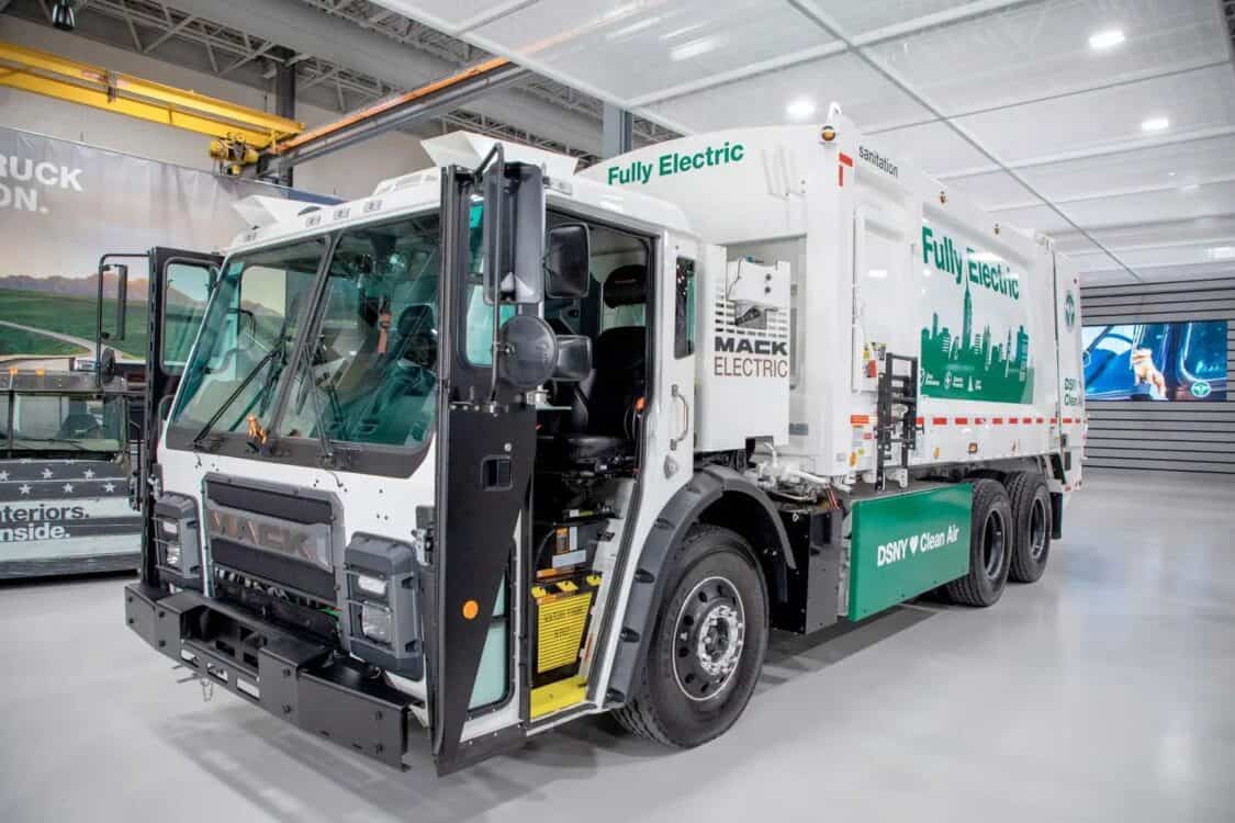 Mack LR Electric garbage truck for NYC’s Department of Sanitation, highlighting clean air efforts with fully electric waste collection.