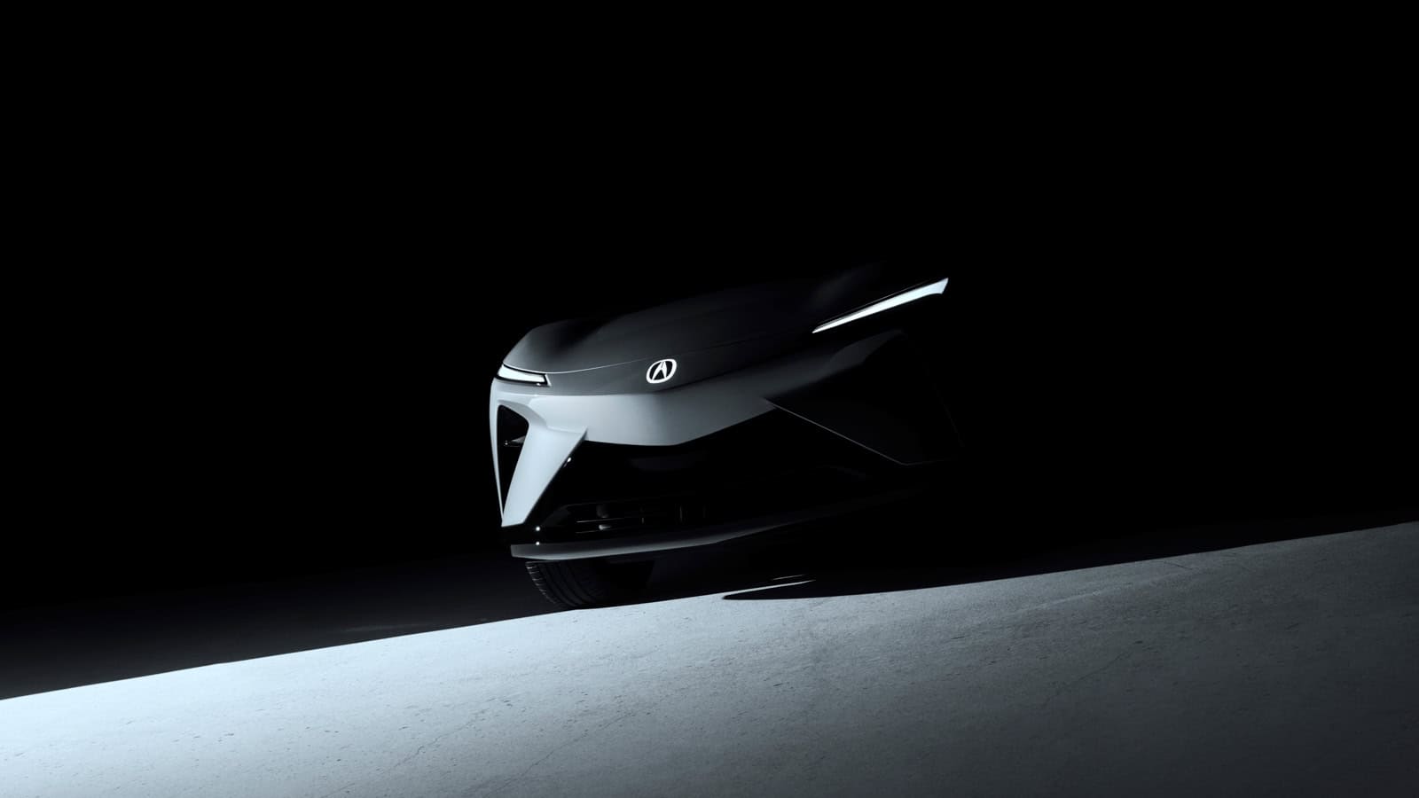 Dark teaser image of the 2026 Acura RSX Prototype EV SUV front end with slim headlights and an illuminated Acura badge.