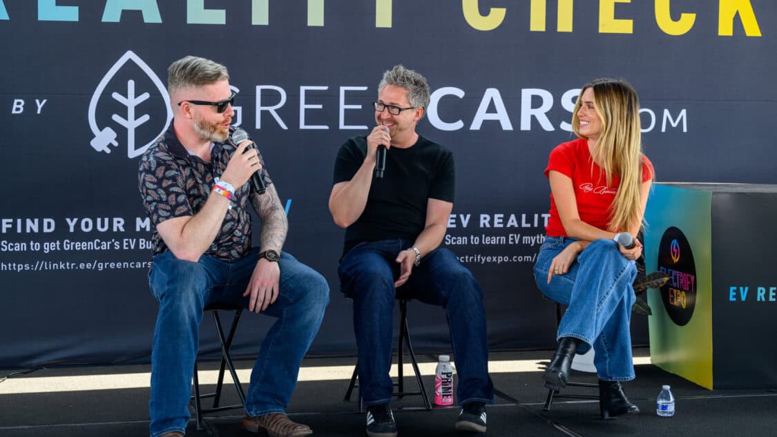 Rogan O'Handley and Emily Wilson on stage with Matt Teske at Electrify Expo during an EV Reality Check session, powered by GreenCars, filmed for media coverage on electrification and EV technology