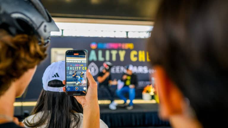 Sur Ronster on stage with Diego Cardenas at Electrify Expo during an EV Reality Check session, powered by GreenCars, filmed for media coverage on electrification and EV technology
