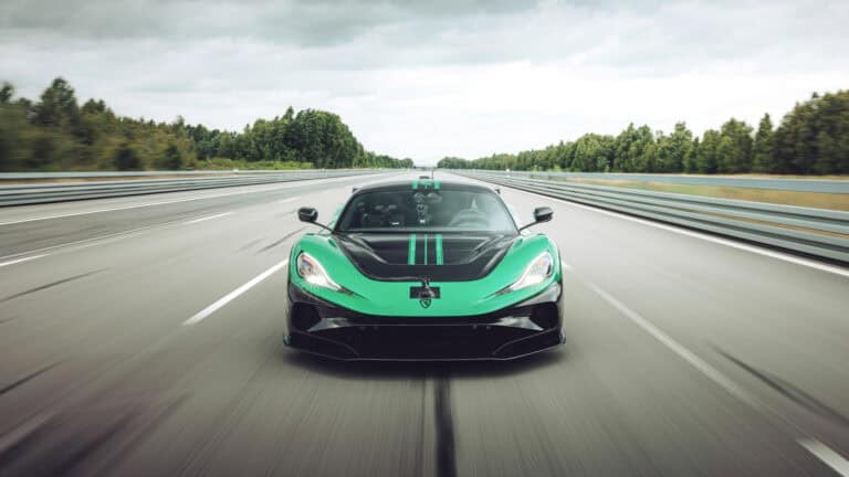 Front view of the Rimac Nevera R at high speed on a closed track, following its record-breaking 0–400–0 km/h performance run.