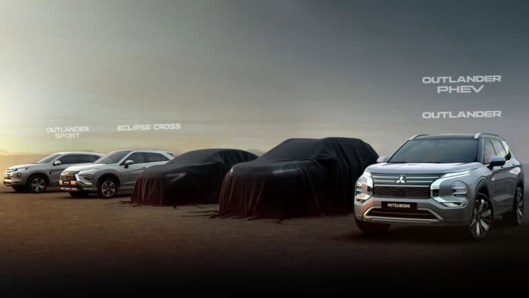 Mitsubishi SUV lineup featuring Outlander Sport, Eclipse Cross, and Outlander models, with two upcoming vehicles covered under wraps.