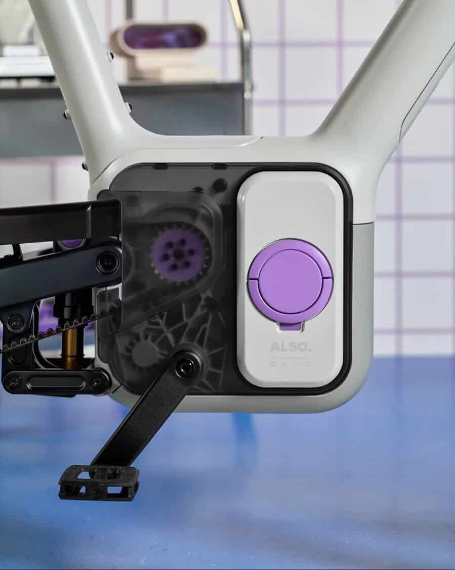 Close-up of the ALSO TM-B e-bike’s modular battery pack and drivetrain with the signature purple DreamRide system.