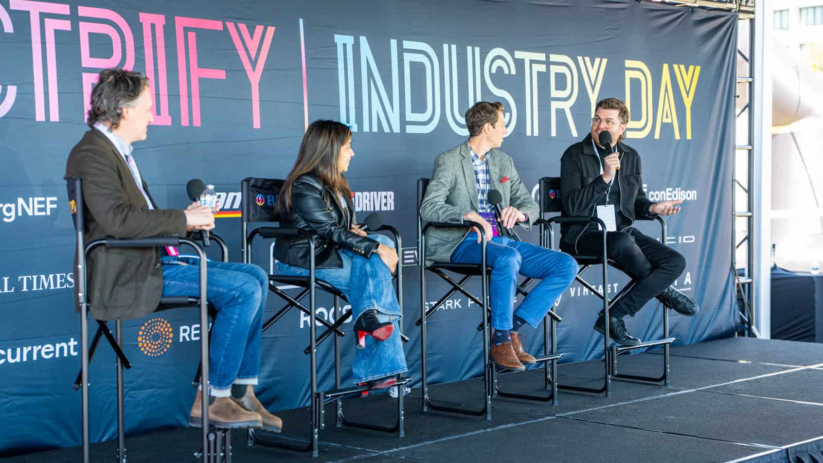 Panelists from Michelin, QNX and Can-Am discuss EV performance onstage at Electrify Expo Industry Day in New York.