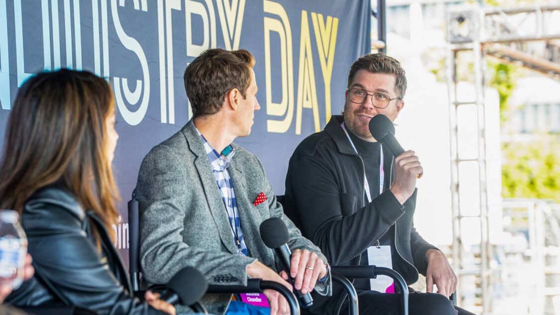 Sharda Mohammed of Michelin, Matthew Chandler of QNX, and Marc-Olivier Drouin of Can-Am discuss EV performance onstage at Electrify Expo Industry Day in New York.
