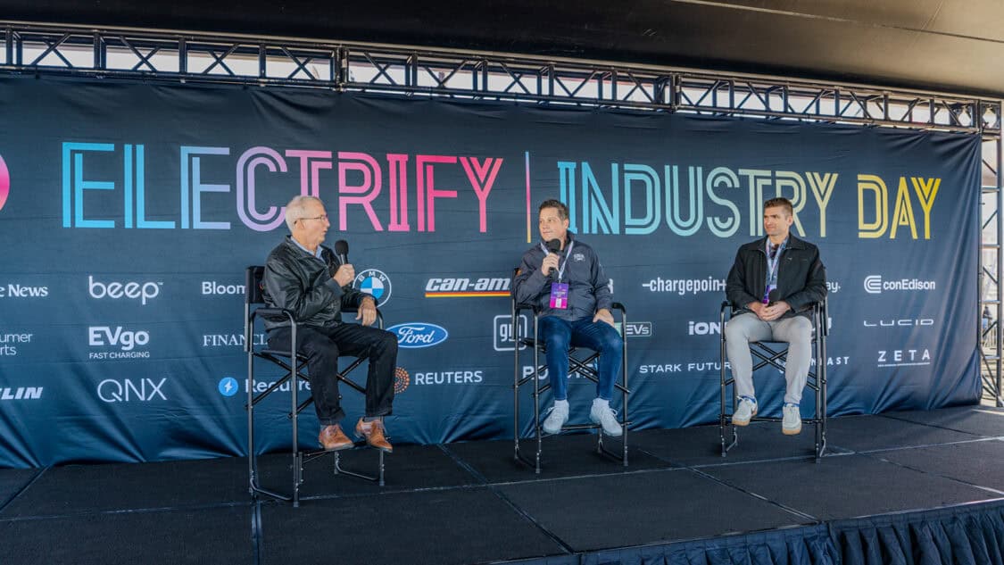Panel discussion at Electrify Expo Industry Day featuring John Voelcker, GM engineer Andy Oury, and Stark Future’s Dan Quick talking EV range and charging.