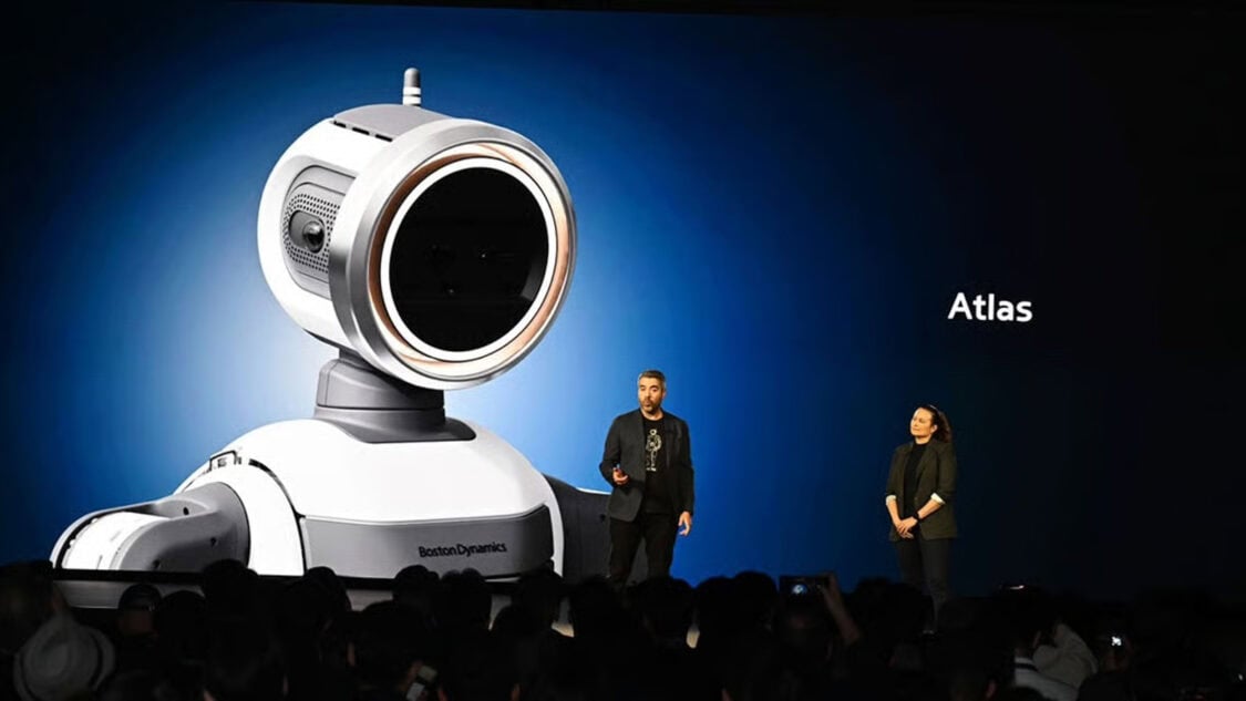 Atlas robot reveal at CES 2026 with Hyundai and Boston Dynamics executives discussing human supervised industrial robotics.