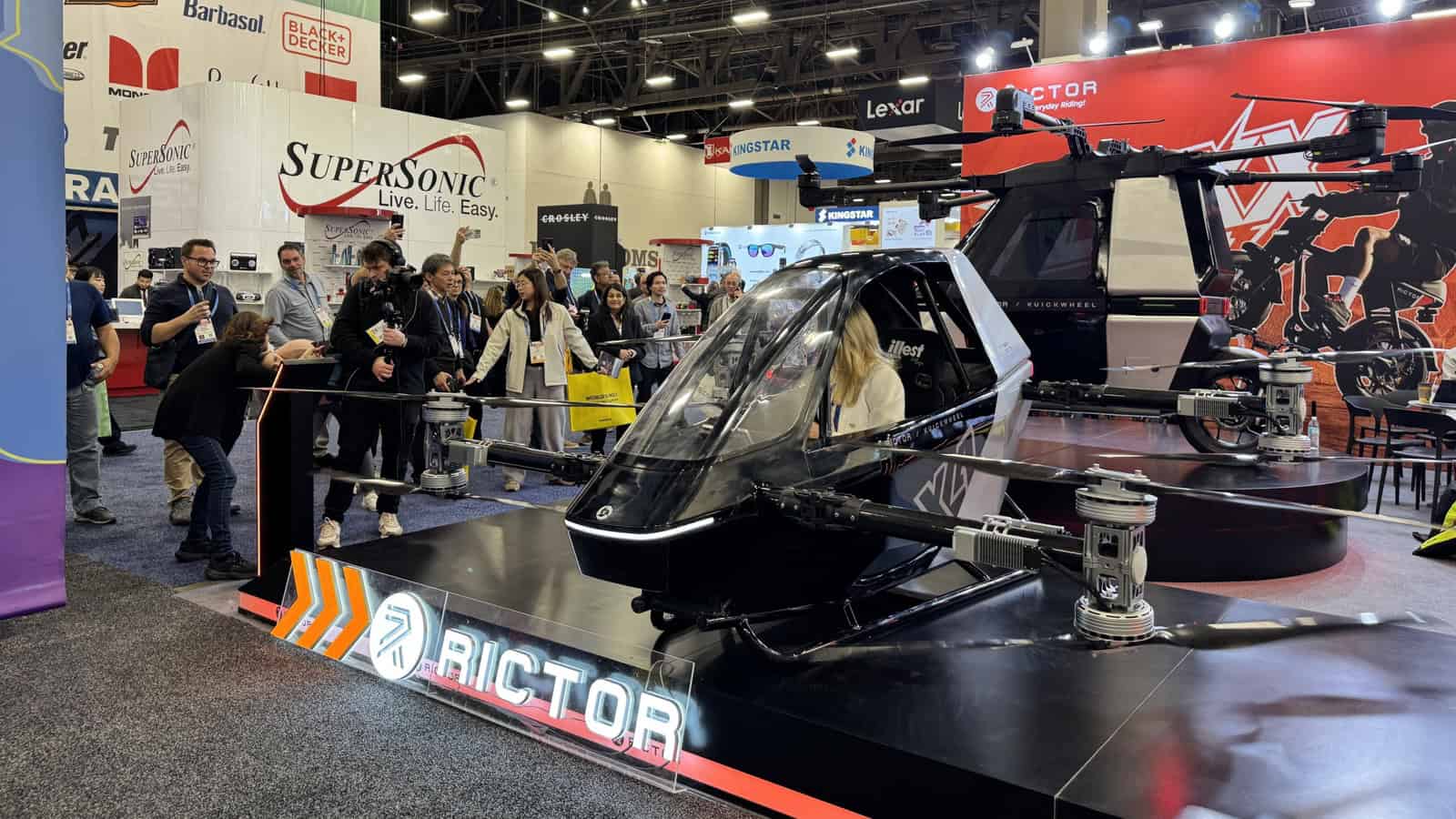 Rictor X4 ultralight eVTOL air mobility pod displayed at CES 2026 with eight propellers and compact cockpit