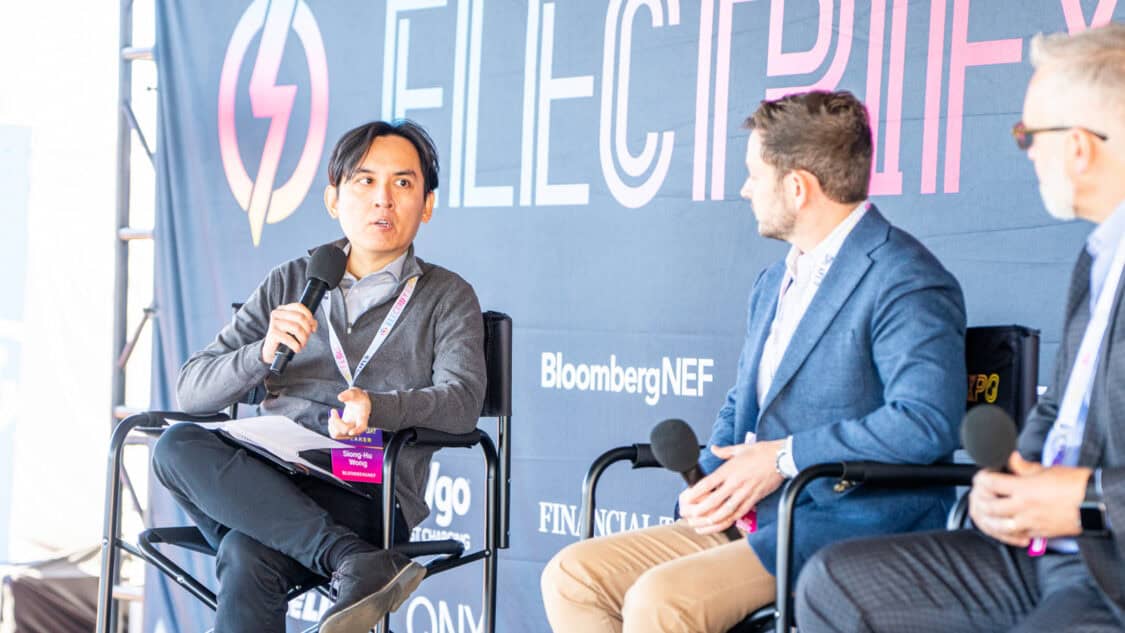 Panel discussion on autonomy, AI safety, and robotic EV charging at Electrify Expo Industry Day. Moderator: Siong-Hu Wong, BloombergNEF; Speakers: Clayton Tino, President and Chief Operating Officer of Beep; Mark Henderson, Chief Commercial Officer of Rocsys.