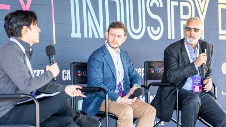 Panel discussion on autonomy, AI safety, and robotic EV charging at Electrify Expo Industry Day. Moderator: Siong-Hu Wong, BloombergNEF; Speakers: Clayton Tino, President and Chief Operating Officer of Beep; Mark Henderson, Chief Commercial Officer of Rocsys.